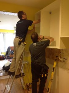 Richard and Reinhardt putting in my cupboards.