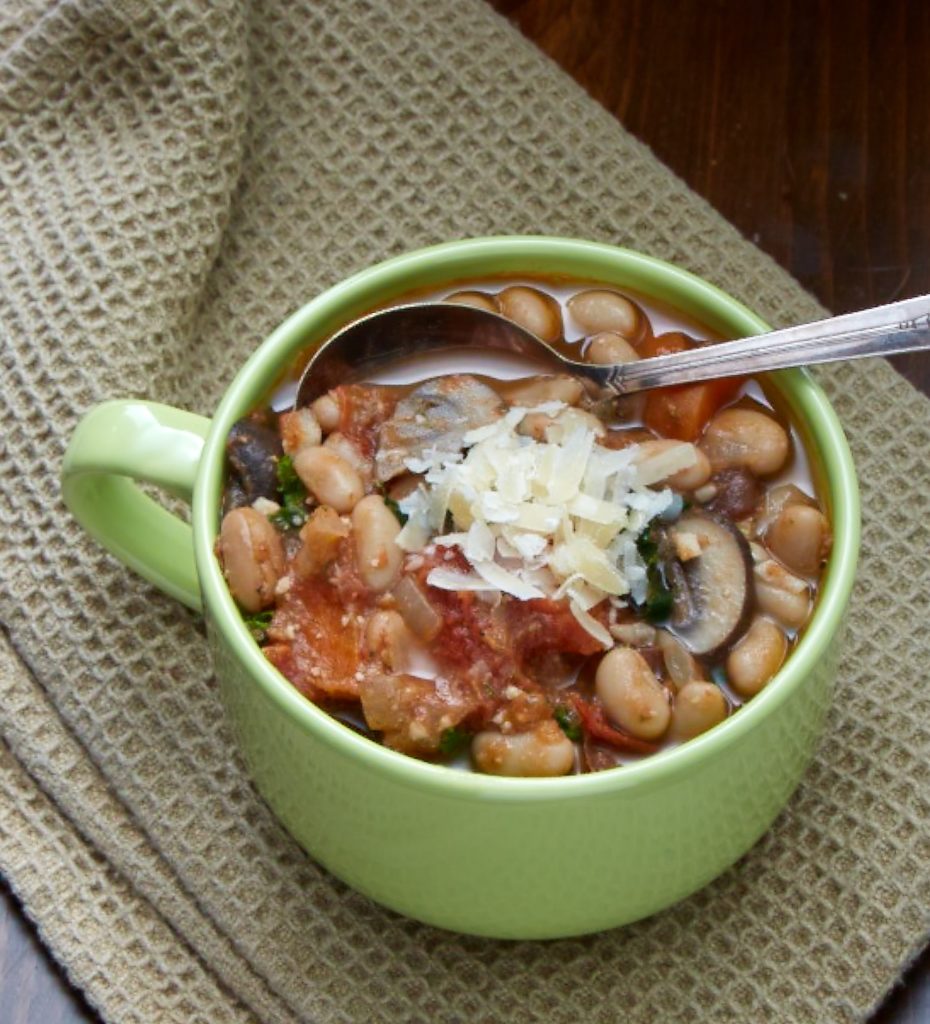 A bowl of a main course white bean soup