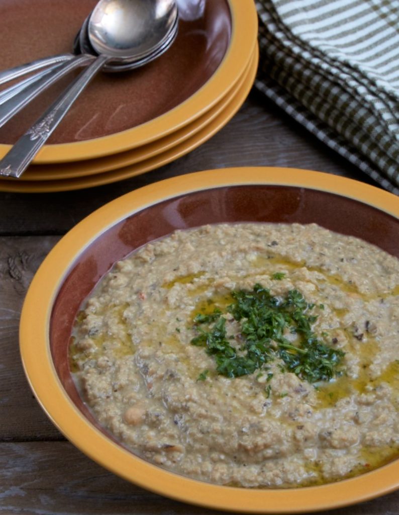 a bowl of eggplant and chickpea soup