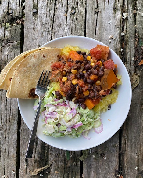 a plate of chicken and black bean chili